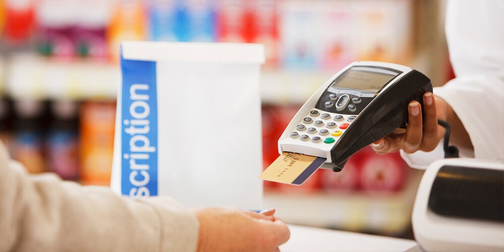 A person is paying with a credit card at a store.