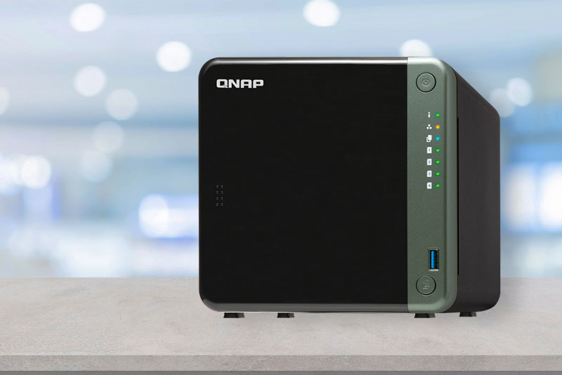 A black nas server sitting on top of a table.