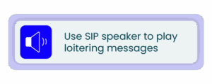 A blue and white sign with a speaker icon and the text “Loitering timer at side entrance.”.